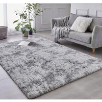 Plüschiger grauer Teppich von REBIKO