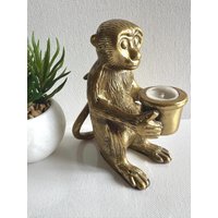 "Dekorativer Kerzenständer Aus Messing in Form Eines "Affen"." "Dekorativer Kerzenständer Aus Messing in Form Eines "Affen"." von RetroCommode