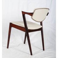 Palisander Und Leder Stühle Von Kai Kristiansen Modell 42 Palisander Und Leder Stühle Von Kai Kristiansen Modell 42 von RyszardChwastyk