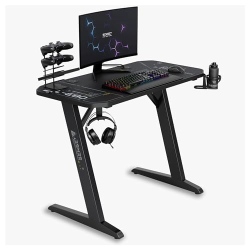 SENSE7 Schreibtisch Nomad Cybernetic, Gaming Tisch 100x50, PC Tisch mit Kopfhörerhaken, Getränkehalter, Controller Halter, Gaming Computertisch mit Kohlefaseroberfläche, Ergonomischer Gaming Desk von SENSE7