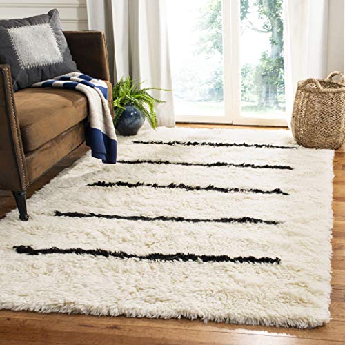 SAFAVIEH Boho Teppich für Wohnzimmer, Esszimmer, Schlafzimmer - Kenya Collection, Hoher Flor, Elfenbein und Schwarz, 160 X 229 cm SAFAVIEH Boho Teppich für Wohnzimmer, Esszimmer, Schlafzimmer - Kenya Collection, Hoher Flor, Elfenbein und Schwarz, 160 X 229 cm von Safavieh