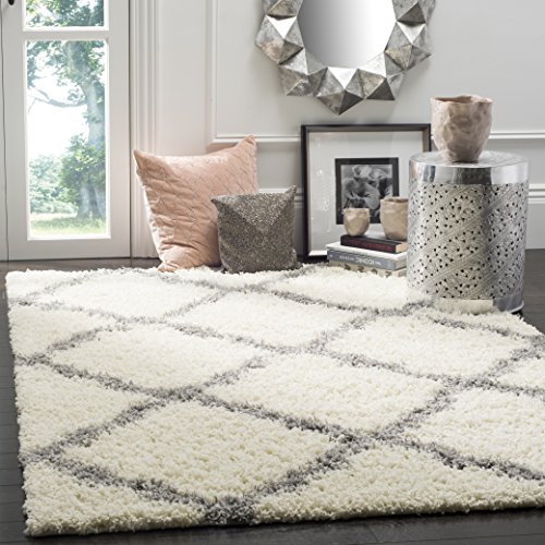 SAFAVIEH Zottelig Teppich für Wohnzimmer, Esszimmer, Schlafzimmer - Dallas Shag Collection, Hoher Flor, Elfenbein und Grau, 122 X 183 cm SAFAVIEH Zottelig Teppich für Wohnzimmer, Esszimmer, Schlafzimmer - Dallas Shag Collection, Hoher Flor, Elfenbein und Grau, 122 X 183 cm von Safavieh