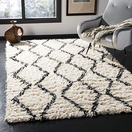 SAFAVIEH Boho Teppich für Wohnzimmer, Esszimmer, Schlafzimmer - Kenya Collection, Hoher Flor, Schwarz und Elfenbein, 160 X 229 cm SAFAVIEH Boho Teppich für Wohnzimmer, Esszimmer, Schlafzimmer - Kenya Collection, Hoher Flor, Schwarz und Elfenbein, 160 X 229 cm von Safavieh
