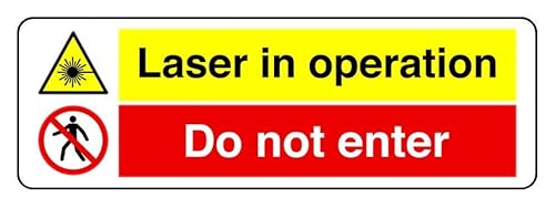 Laser in Operation Gy Do Not Enter Sicherheitsschild – selbstklebendes Schild mit hoher Haftung (600 mm x 300 mm) Sichtweite innerhalb von 14 m. von Safety First Display LTD