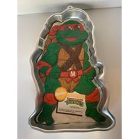 Vintage Wilton Teenage Mutant Ninja Turtles-Kuchenform, New Old Stock Tmnt-Kuchenform Mit Originalpapier Dekorationstipps von SamsFunkyFinds