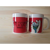 Tasse The Future Is in Our Hands Tasse The Future Is in Our Hands von Schwarzesocke