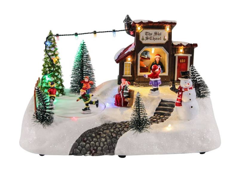 Spetebo Weihnachtsszene Eisbahn mit fahrenden Figuren - THE SKI SCHOOL, Batterie betriebene LED Weihnachtsszene von Spetebo