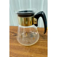Vintage Mid Century Corning Hitzebeständiges Glas Gold Starburst Kaffee Karaffe von Stevecollectables