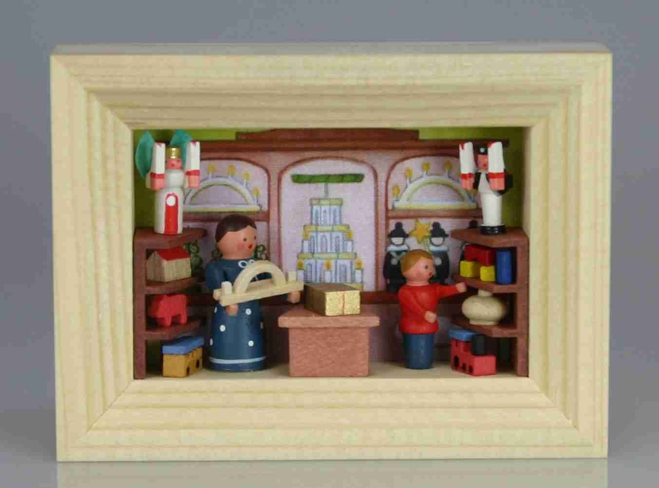 Stübelmacher Gunter Flath Weihnachtsfigur Weihnachtsdekoration Miniatur im Rähmchen Spielzeugladen BxH 7x5,5cm von Stübelmacher Gunter Flath