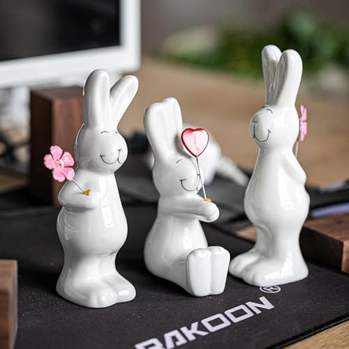 Super Idee 3er Set Stehende und Sitzende Osterhasen Figuren aus Keramik mit Blumen und Herzen Osterdeko zum Hinstellen 14 cm - Hasenfiguren als Ostergeschenk Hasen Ostern Deko von Super Idee