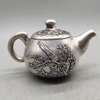 Sammlung Tibetsilber Weiß Kupfer Handgeschnitzt Blume Und Vogel Muster Tee Sets Teekannen Sammlung Tibetsilber Weiß Kupfer Handgeschnitzt Blume Und Vogel Muster Tee Sets Teekannen von Susiepingg
