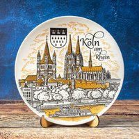 Kölner Teller. Gold Stil Hängende Wand Porzellan Platte Dekor 20 cm Dekoratives Souvenir Mit Ständer Köln Germany Kölner Teller. Gold Stil Hängende Wand Porzellan Platte Dekor 20 cm Dekoratives Souvenir Mit Ständer Köln Germany von SuvenixCityPlates