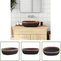 The Living Store - Aufsatzwaschbecken Schwarz und Orange Oval 47x33x13 cm Keramik - Badezimmersanierung - Waschbecken Schwarz Orange The Living Store - Aufsatzwaschbecken Schwarz und Orange Oval 47x33x13 cm Keramik - Badezimmersanierung - Waschbecken Schwarz Orange von THE LIVING STORE