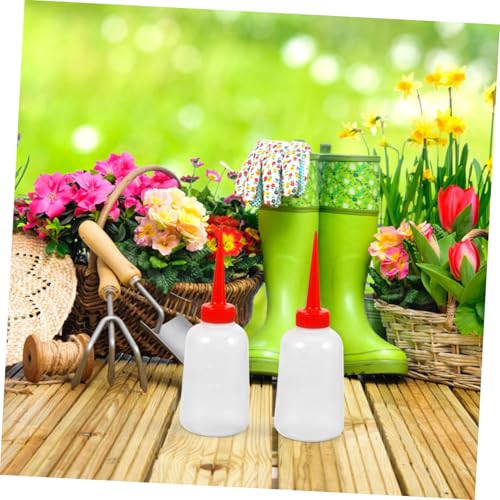 TOGEVAL 4 Stück Automatisches Bewässerungssystem Selbstbewässerungspflanzen Spikes für Topfpflanzen Zimmerpflanzen Garten Wasserspender Langlebig und Einfach zu Bedienen von TOGEVAL