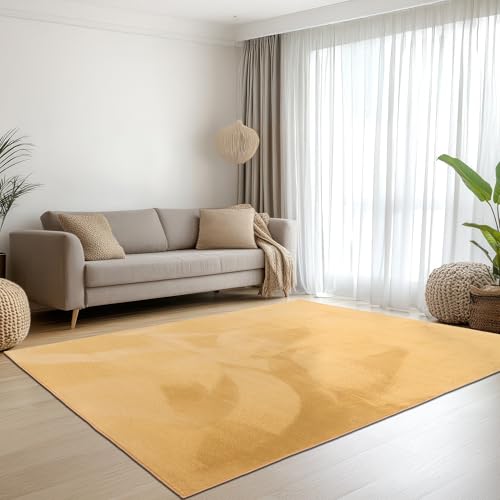 Teppich-Traum Teppich Wohnzimmer Schlafzimmer Kurzflorteppich Hasenfell Kunstfell Optik seidig weich samtig schimmernd pflegeleicht einfarbig Gold 120 x 170 cm Teppich-Traum Teppich Wohnzimmer Schlafzimmer Kurzflorteppich Hasenfell Kunstfell Optik seidig weich samtig schimmernd pflegeleicht einfarbig Gold 120 x 170 cm von Teppich-Traum