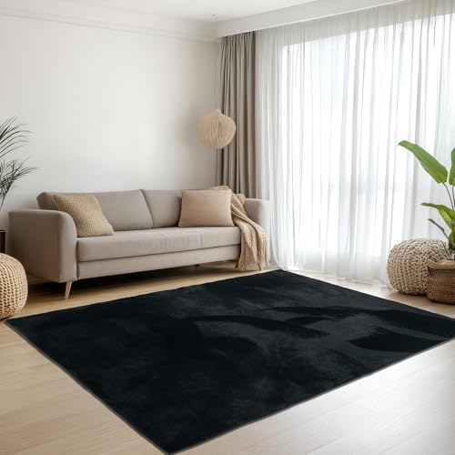 Teppich-Traum Teppich Wohnzimmer Schlafzimmer Kurzflorteppich Hasenfell Kunstfell Optik seidig weich samtig schimmernd pflegeleicht einfarbig schwarz 120 x 170 cm Teppich-Traum Teppich Wohnzimmer Schlafzimmer Kurzflorteppich Hasenfell Kunstfell Optik seidig weich samtig schimmernd pflegeleicht einfarbig schwarz 120 x 170 cm von Teppich-Traum