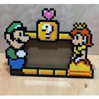 Luigi Und Daisy Bilderrahmen - Gaming Paar Geschenk Luigi Und Daisy Bilderrahmen - Gaming Paar Geschenk von ThaliasCrafts