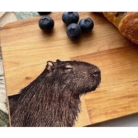 Frühstücksbrett Capybara Geschenkidee Holzbrett Brettchen Wasserschwein Frühstücksbrett Capybara Geschenkidee Holzbrett Brettchen Wasserschwein von TheScientists