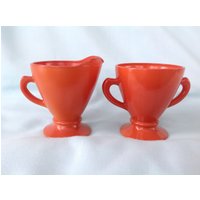 Hazel Atlas Platonite Orange Zucker Und Creamer Set Auf Ovide Gebrannt Hazel Atlas Platonite Orange Zucker Und Creamer Set Auf Ovide Gebrannt von TheVillageCorner
