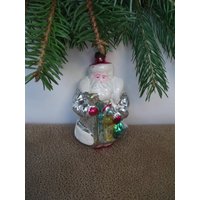 Weihnachtsmann Mit Einer Tüte Geschenken. Hauptweihnachtsverzierung. Vintage Weihnachtsbaum Glas Ornament Weihnachtsmann Mit Einer Tüte Geschenken. Hauptweihnachtsverzierung. Vintage Weihnachtsbaum Glas Ornament von TouchTheOld