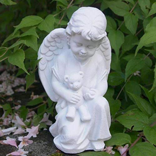 Kleiner Engel mit Trost Teddy im Arm haltend. Kleiner Engel mit Trost Teddy im Arm haltend. von Trauer-Shop