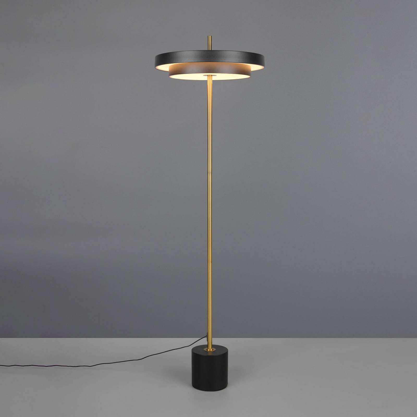 LED-Stehlampe Keaton, schwarz/goldfarben, Höhe 138 cm, CCT LED-Stehlampe Keaton, schwarz/goldfarben, Höhe 138 cm, CCT von Trio Lighting