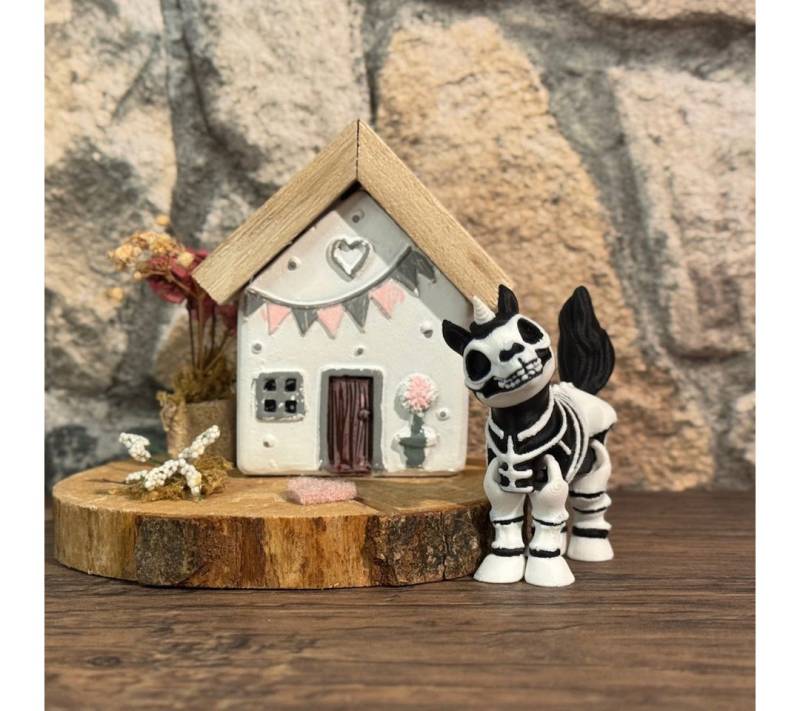 UDINGO Dekofigur Skeleton Unicorn – Das schaurig-schöne Knochen-Einhorn UDINGO Dekofigur Skeleton Unicorn – Das schaurig-schöne Knochen-Einhorn von UDINGO