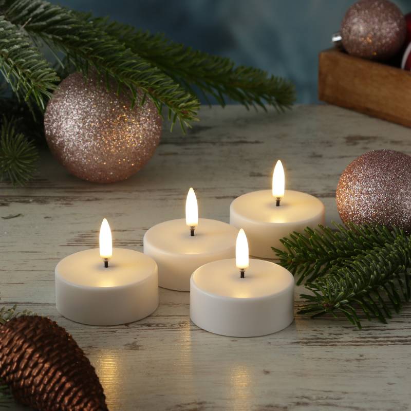 LED Maxi Teelichter - 4 wiederaufladbare LED Teelichter - D: 6cm - Timer - weiß - für Außen von UYUNI