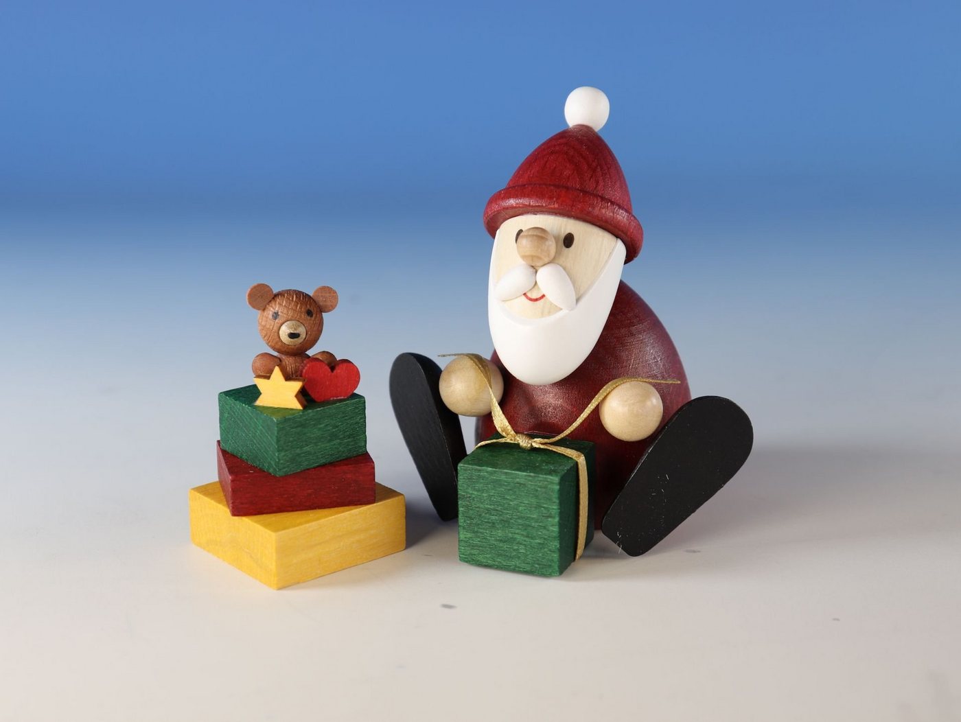 Ullrich Kunsthandwerk Weihnachtsmann Geschenkset Weihnachtsmann mit Geschenkestapel, in Klarsicht Geschenkbox von Ullrich Kunsthandwerk