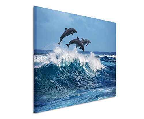 Unique Fotoleinwand 120x80cm Tierbilder – DREI springende Delfine über Einer Meereswelle von Unique