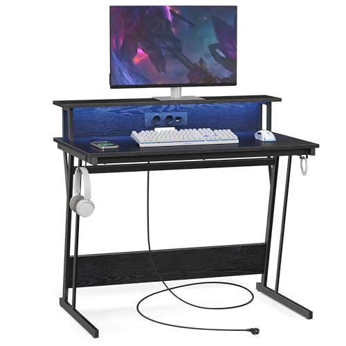 VASAGLE Schreibtisch, Gaming Tisch mit eingebauter Steckdosenleiste, Computertisch, mit Monitorständer für 2 Monitore, Schlafzimmer, 60 x 100 x 76 cm, ebenholzschwarz LWD191B56 von VASAGLE