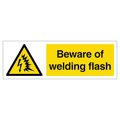 Beware of welding flash, schmale Querformat, 600 x 200 mm, leuchtet im Dunkeln, 1 mm starrer Kunststoff von VSafety