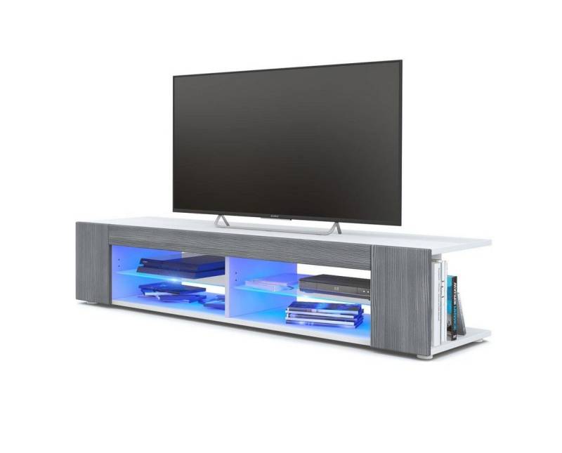 Vladon Lowboard Movie (TV-Kommode, mit 4 offenen Fächern und Zierleisten), Weiß matt/Avola-Anthrazit, inkl. LED-Beleuchtung blau (134x29x39 cm) von Vladon