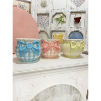 Cute Bow Checkered Pink Blue Ceramic Mug Cute Bow Checkered Pink Blue Ceramic Mug von VolkerBukDesign