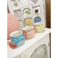 Pink Blue Ceramic Mug Cute Bow Checkered von VolkerBukDesign