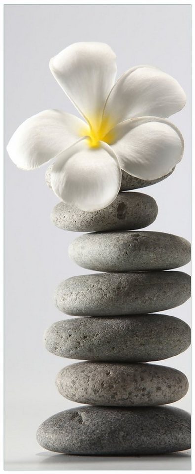 Wallario Acrylglasbild, Blume auf gestapelten Steinen, in verschiedenen Ausführungen von Wallario
