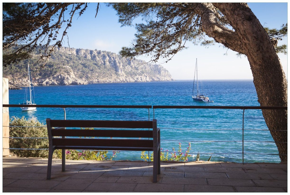 Wallario Acrylglasbild, Einsame Bank am Meer - Spanien im Sommer, in verschiedenen Ausführungen von Wallario