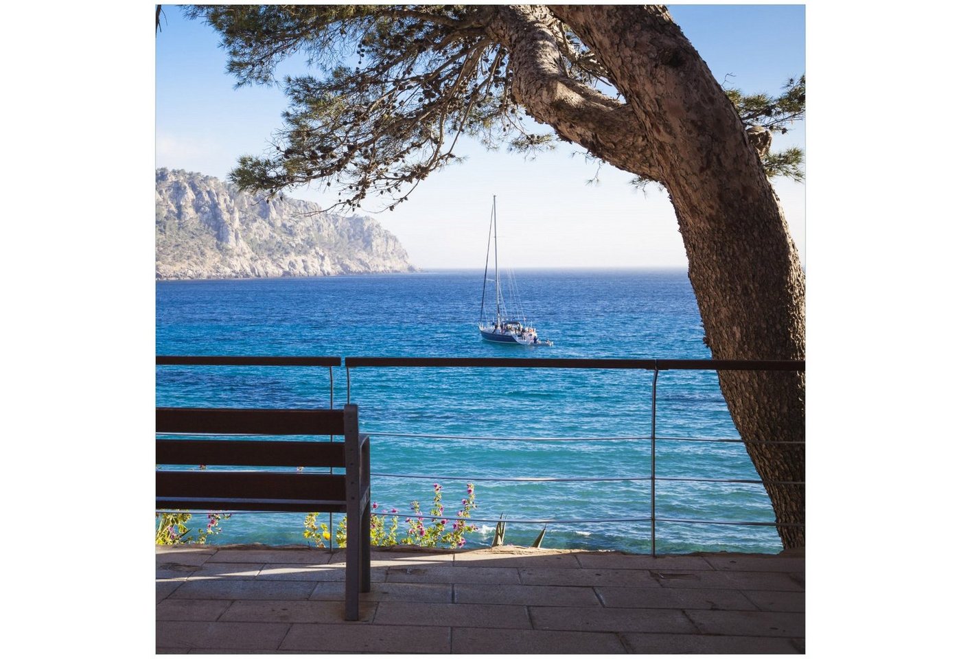 Wallario Acrylglasbild, Einsame Bank am Meer - Spanien im Sommer, in verschiedenen Ausführungen von Wallario