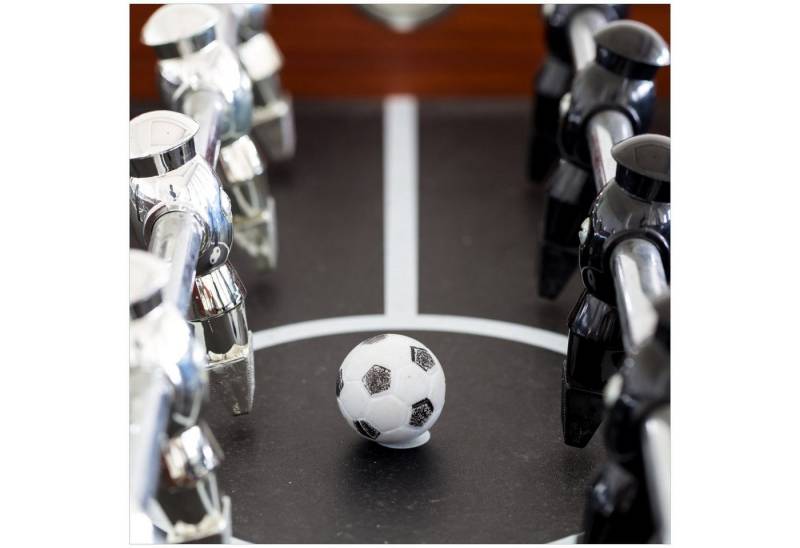 Wallario Acrylglasbild, Kicker-Tisch in Nahaufnahme - Ball in der Mitte, in verschiedenen Ausführungen von Wallario