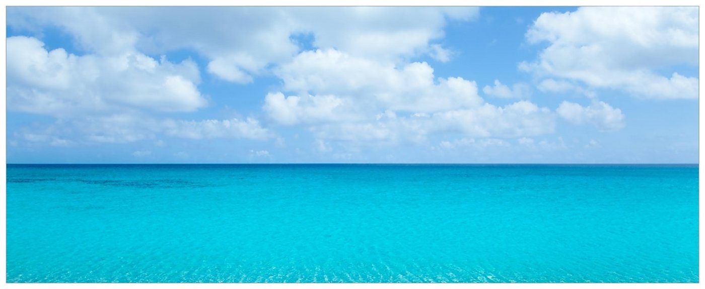 Wallario Acrylglasbild, Sandstrand und blaues Meer, in verschiedenen Ausführungen von Wallario