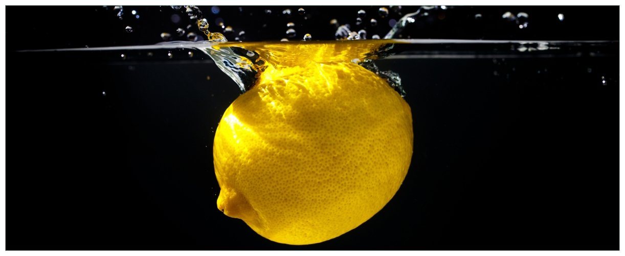 Wallario Acrylglasbild, Zitrone im Wasser - Frisches Obst für die Küche, in verschiedenen Ausführungen von Wallario