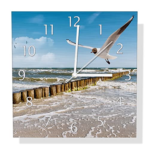Wallario Design Wanduhr Fliegende Möwe am Strand aus Aluverbund, Alu-Uhr Größe 30 x 30 cm, weiße Zeiger mit Metalloptik Wallario Design Wanduhr Fliegende Möwe am Strand aus Aluverbund, Alu-Uhr Größe 30 x 30 cm, weiße Zeiger mit Metalloptik von Wallario