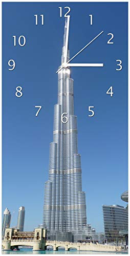Wallario Design-Wanduhr Wolkenkratzer in Dubai aus Glas, Motiv-Uhr Größe 30 x 60 cm, weiße Zeiger Wallario Design-Wanduhr Wolkenkratzer in Dubai aus Glas, Motiv-Uhr Größe 30 x 60 cm, weiße Zeiger von Wallario