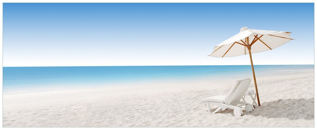 Wallario Glasbild, Sonnenliege am weißen Strand unter blauem Himmel, in verschiedenen Ausführungen von Wallario