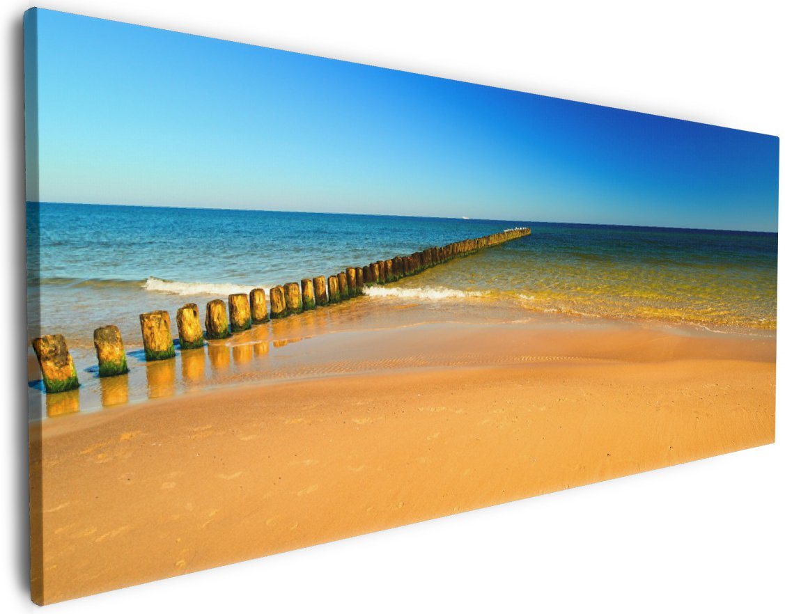 Wallario Leinwandbild, Sandstrand in orange - Blaues Meer - Blauer Himmel, in verschiedenen Ausführungen von Wallario