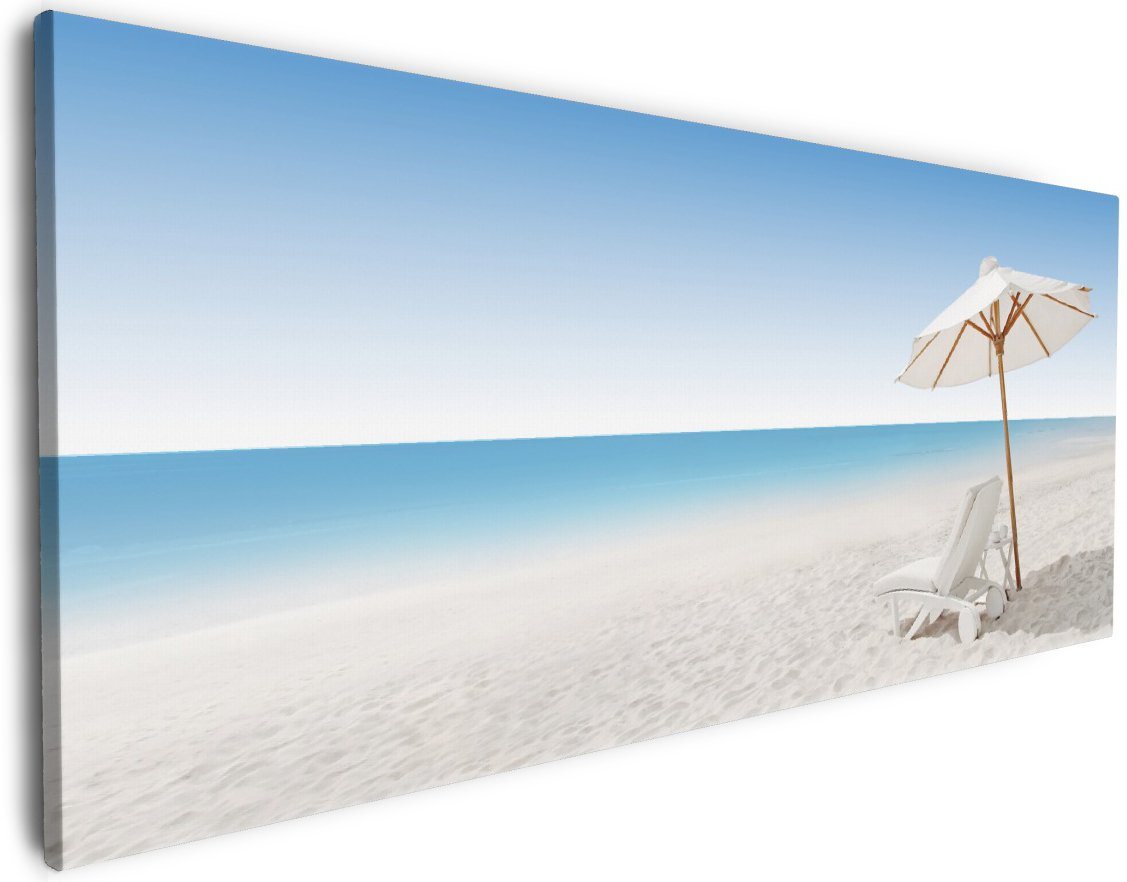 Wallario Leinwandbild, Sonnenliege am weißen Strand unter blauem Himmel, in verschiedenen Ausführungen von Wallario