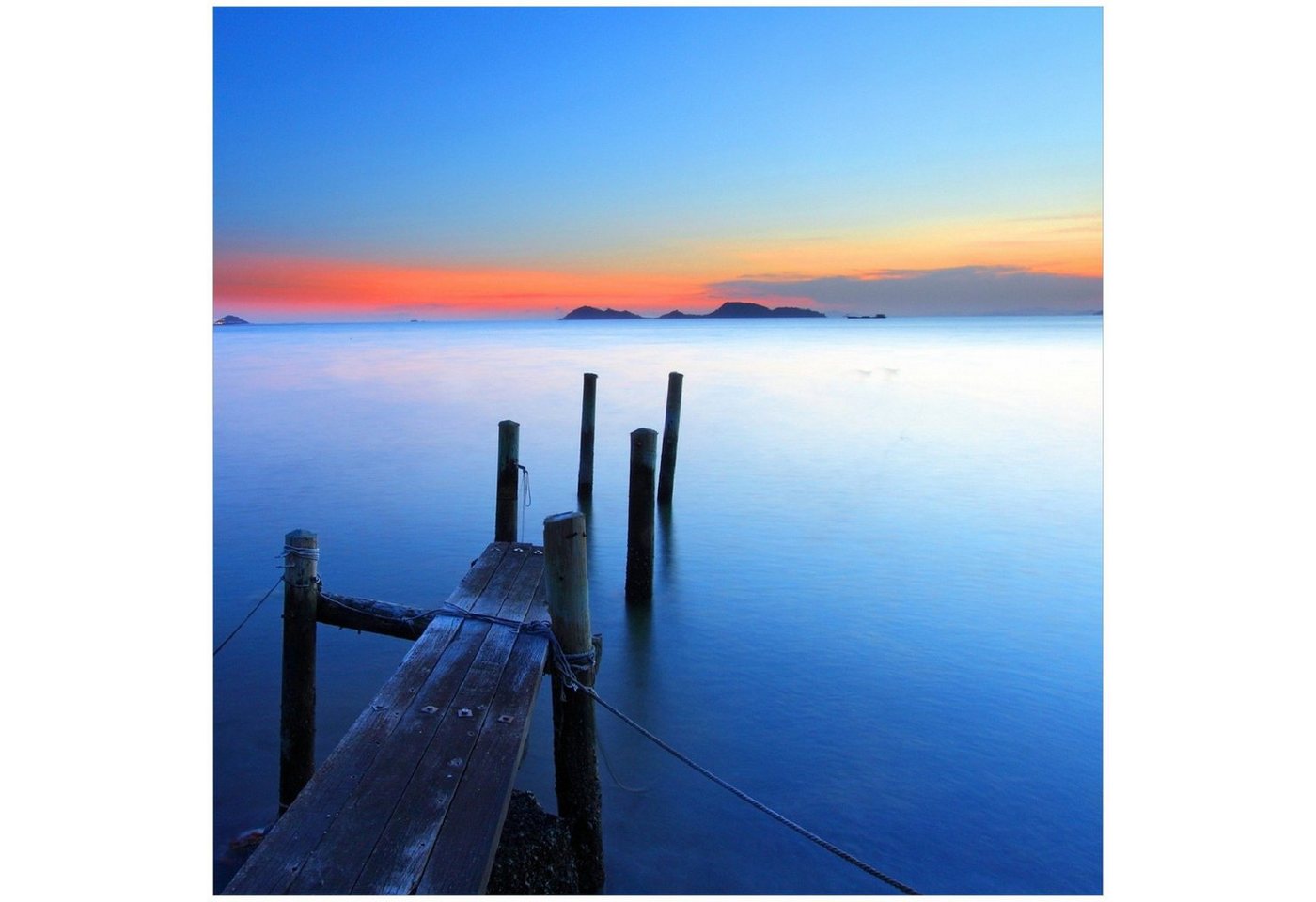 Wallario Memoboard Steg im Wasser - Abendstimmung am Meer von Wallario