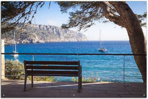 Wallario Outdoor-Poster für Garten oder Balkon Einsame Bank am Meer - Spanien im Sommer, Motivbanner Größe: ca. 60 x 90 cm, Outdoor-Bild von Wallario