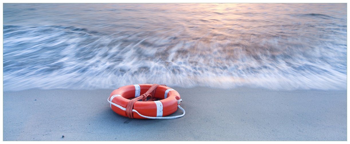 Wallario Poster, Rettungsring am Strand bei Sonnenuntergang, in verschiedenen Ausführungen von Wallario