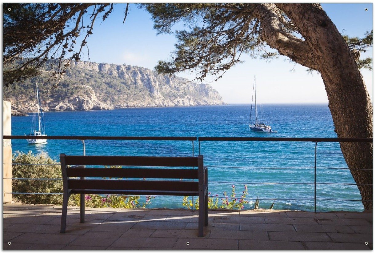 Wallario Sichtschutzzaunmatten Einsame Bank am Meer - Spanien im Sommer von Wallario